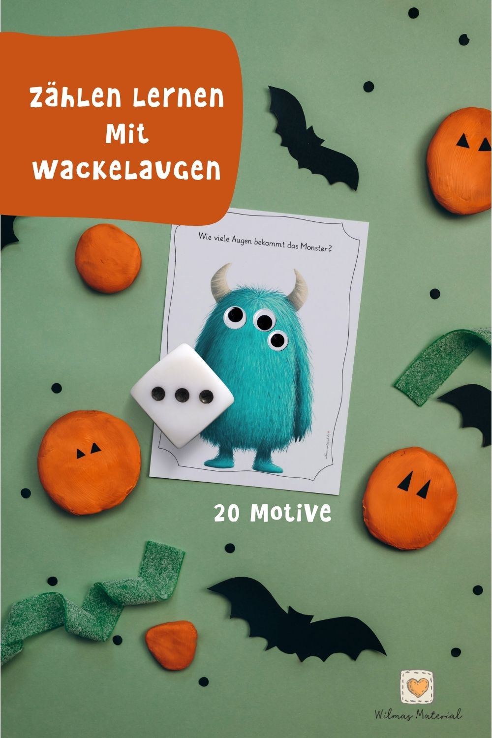 Zählen lernen im Kindergarten mit Wackelaugen: Der Würfel zeigt drei, das Monster auf der Halloween-Bildkarte hat drei Augen